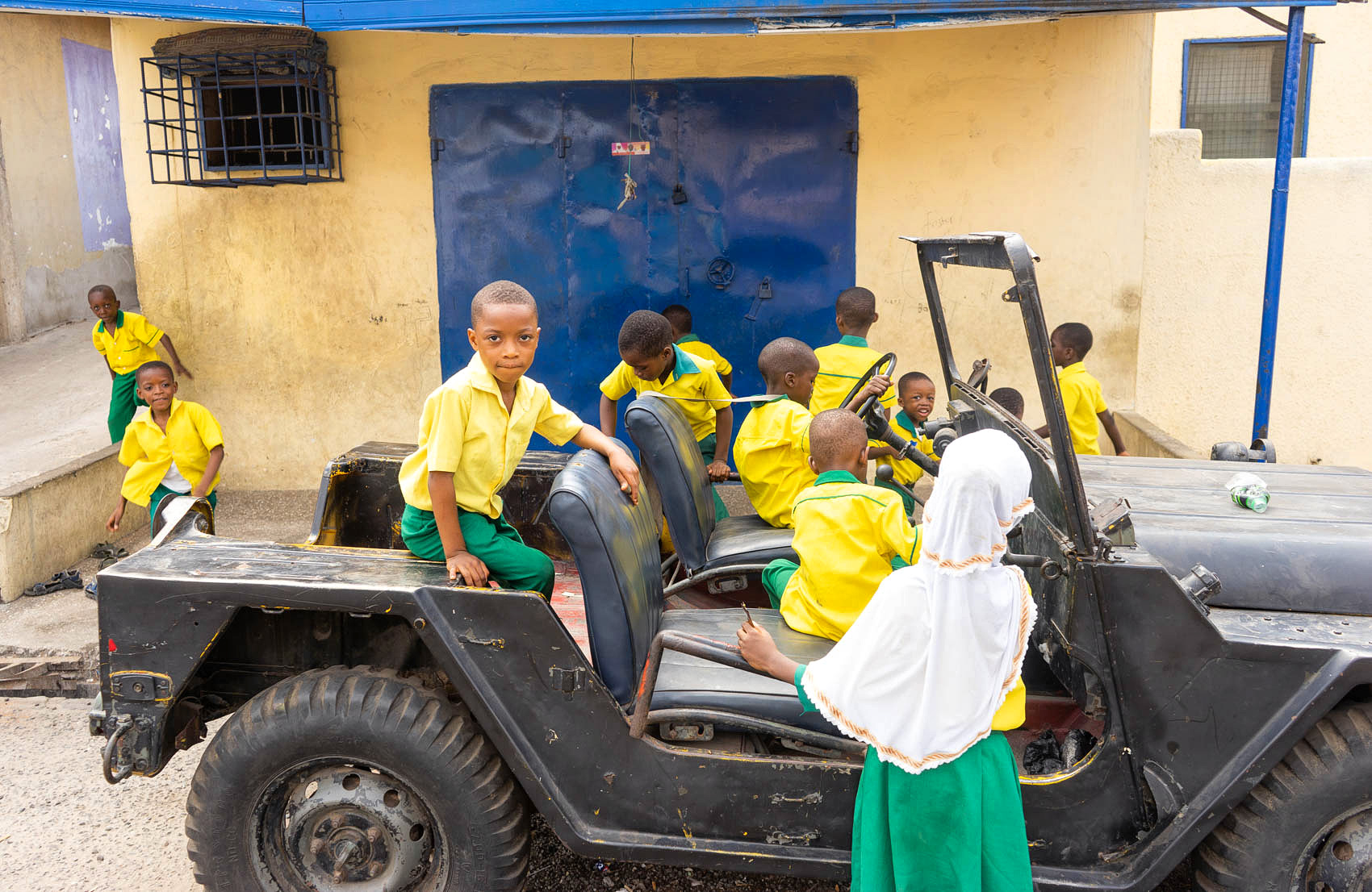 Ghanian Kids playing in old jeep